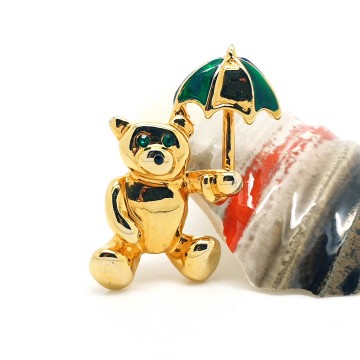 Goldtone teddybear brooch with green rhinestone eyes and umbrella - Bliinkt