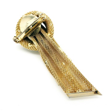 Goudkleurige 50s lintbroche met turquoise steentjes