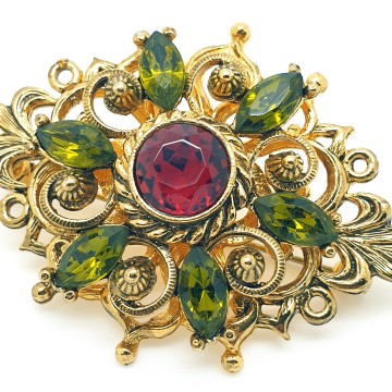 Goldtone brooch with red center rhinestone surrounded by green rhinestones - Bliinkt