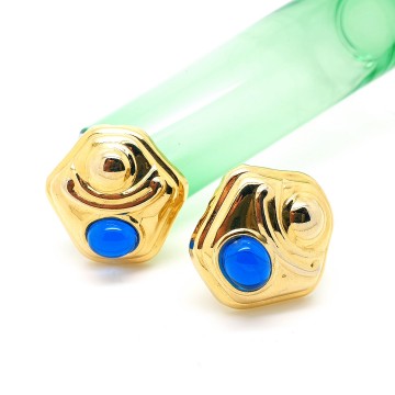 Goudkleurige blikken oorbellen met blauwe cabochon   bliinkt