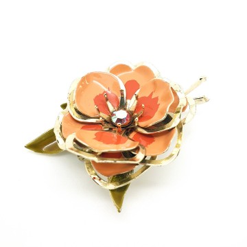 Goldtone flower brooch with salmon enamelled leaves and ab rhinestone - Bliinkt