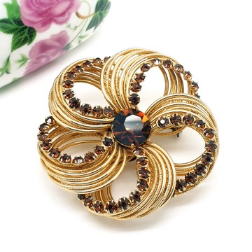 Goldtone flower shaped wire brooch with brown rhinestones - Bliinkt