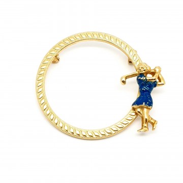 Goudkleurige circelbroche met golfster met blauw jurkje