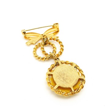 Goldtone dangle brooch with plastic yellow flower