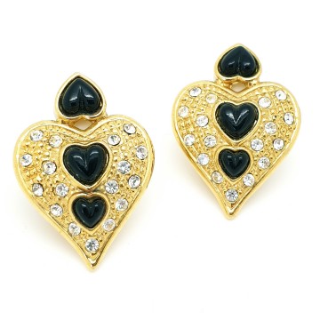 Goudkleurige hartvormige 80s oorbellen met zwarte hartvormige cabochons