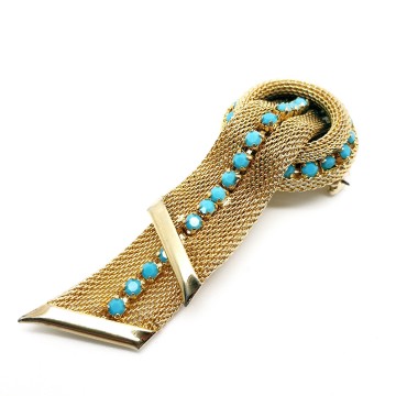 Goudkleurige lintbroche met turquoise steentjes 50s