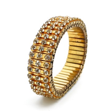 Goudkleurige stretcharmband met heldere strass