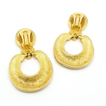 Grote opvallende goudkleurige 80s statementoorbellen