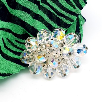 Heldere glaskralenbroche met aurora borealisgloed - Bliinkt