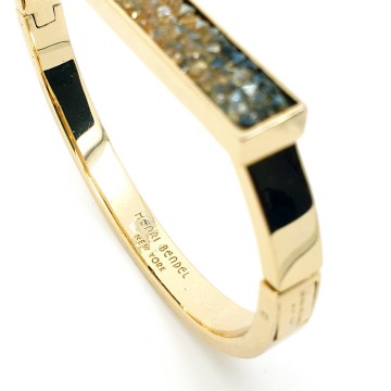 Henri Bendel New York goldtone bangle with black enamel and reversed rhinestones