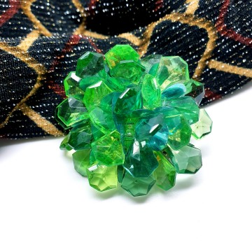 Hong Kong green plastic brooch