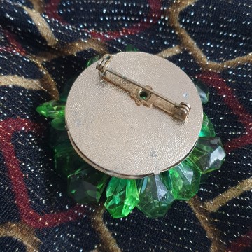Hong Kong green plastic brooch