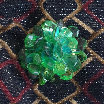 Hong Kong green plastic brooch