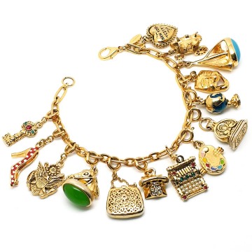 Joan Rivers - goldtone charm bracelet with 14 charms - Bliinkt