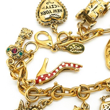 Joan Rivers - goldtone charm bracelet with 14 charms - Bliinkt