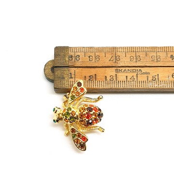 Joan Rivers goldtone bee brooch with multicoloured rhinestones - Bliinkt