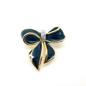 Keyes - goldtone black enamelled bow brooch with clear rhinestones - Bliinkt