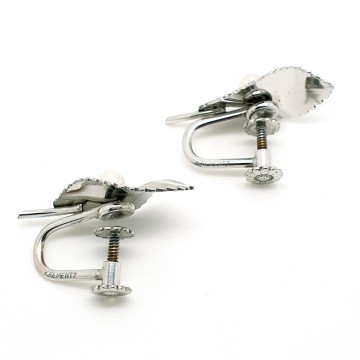 Krementz zilverkleurige vergulde schroefoorbellen met cultivéparel