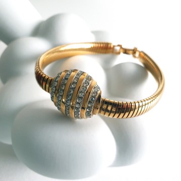 Lanvin Paris - goldtone stretch bracelet with round centerpiece with rhinestones - Bliinkt