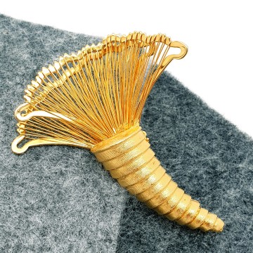 Large goldtone cornucopia brooch