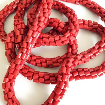 Long weighty necklace with tube shaped coral red glass beads - Bliinkt