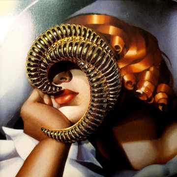 Monet - goldtone ribbed ram's horn brooch - Bliinkt