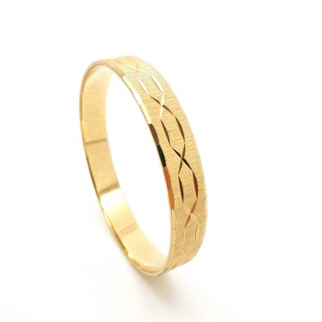 Monet goudkleurige 'bangle'