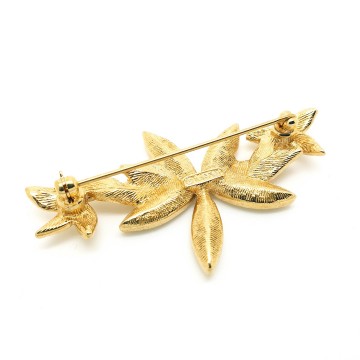 Monet - goldplated crystal flower brooch - Bliinkt