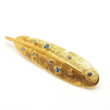 Monet goldtone feather brooch with clear and lightblue rhinestones