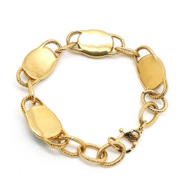 Monet - goldtone link bracelet with black cabochons - Bliinkt