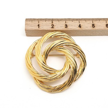 Monet - goldtone ribbed cord intertwined circles brooch - Bliinkt