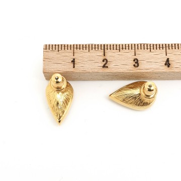 Monet - goldtone teardrop shaped earrings with crystal glass - Bliinkt