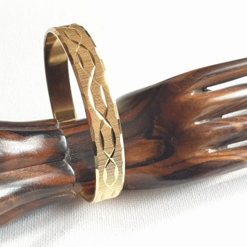 Monet goudkleurige 'bangle'