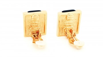 Monet goudkleurige clipsoorbellen met  bruine steen 80s 90s achterkant