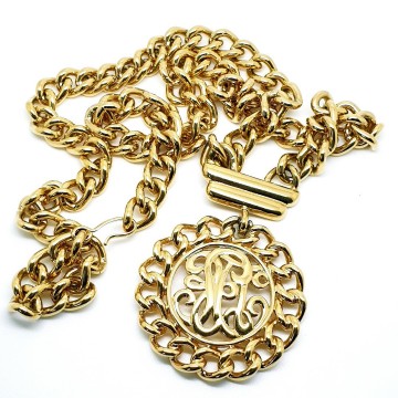 Monet goudkleurige schakelketting  met monogram 50's 60's