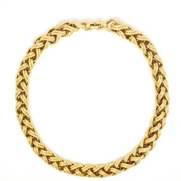Monet korte, dikke, zware goudkleurige schakelketting