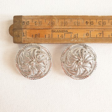 Monet round open work silvertone clip earrings