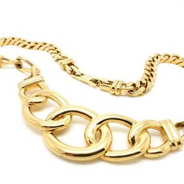 Monet schakelketting met middenstuk van geweven schakels