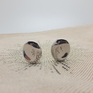 Monet - shiny silvertone wavy earrings - Bliinkt