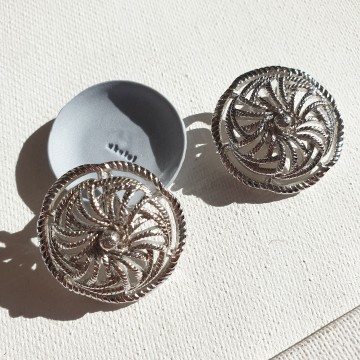 Monet round open work silvertone clip earrings