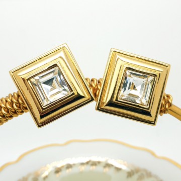 Monet - gold plated square stud clip earrings with clear faceted glass stone - Bliinkt