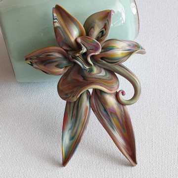 Mutlicoloured plastic flower brooch