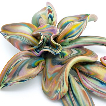 Mutlicoloured plastic flower brooch