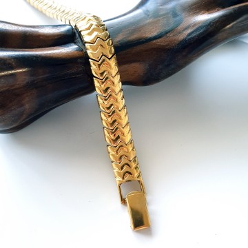 Napier goldtone flexible bracelet - Bliinkt