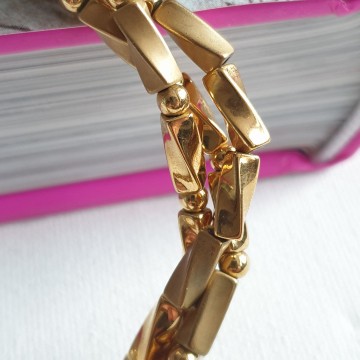 Napier short goldtone twisted three string necklace