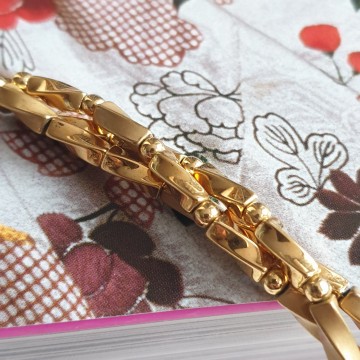 Napier short goldtone twisted three string necklace