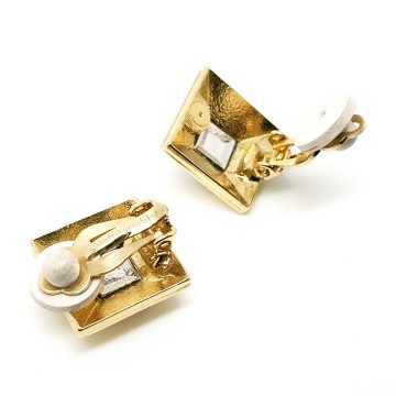 Nina Ricci goudkleurige oorbellen met heldere strass gesigneerd