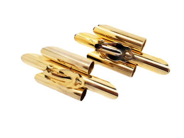 Grote goudkleurige panfluitachtige oorbellen met in het midden en zwarte plastic seen 60's achterkant