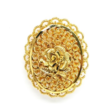 Oval goldtone open work rose brooch