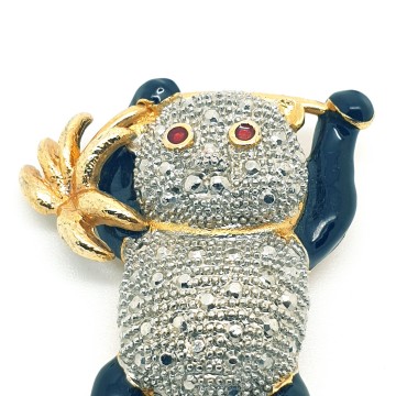 Panda bear brooch with palm branch, red eyes, silver belly and black enamelled arms and legs - Bliinkt